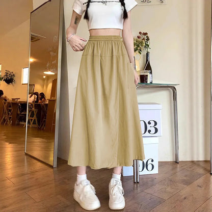 Women's camel coloured wide leg cropped skirt with elastic waistband and drape detailing