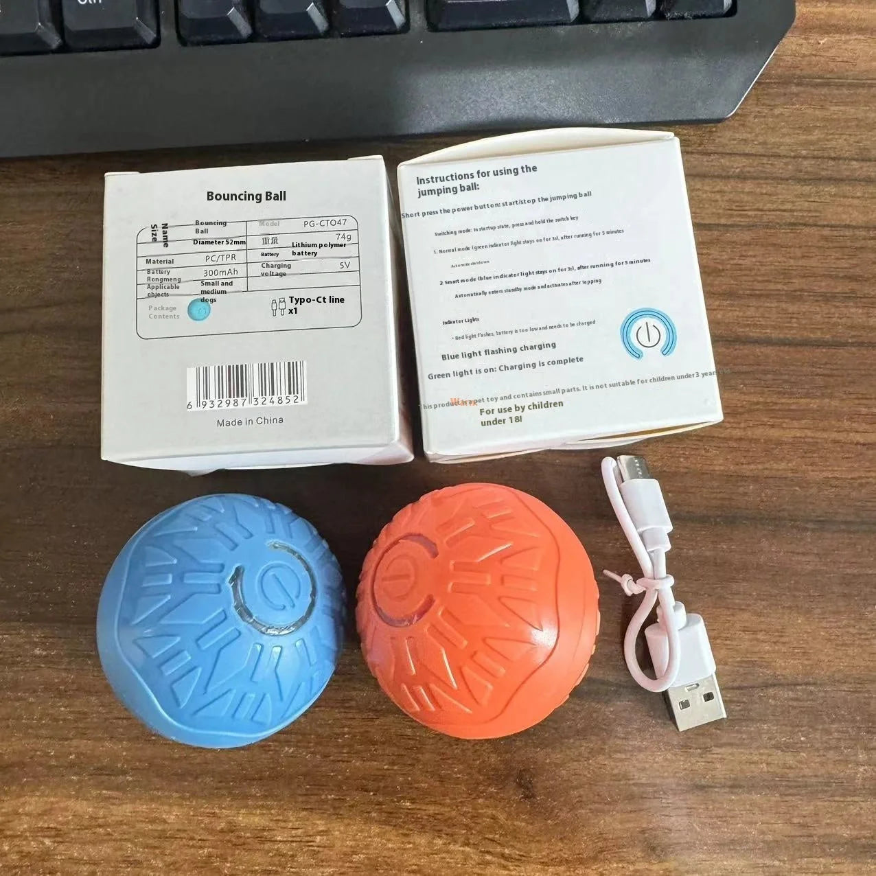 Luminous silicone electric jumping ball for dogs in blue and orange