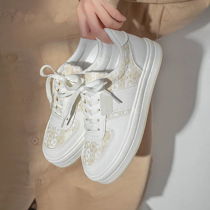 Beige and plaid patterned platform sports shoes with round toe and white rubber sole.