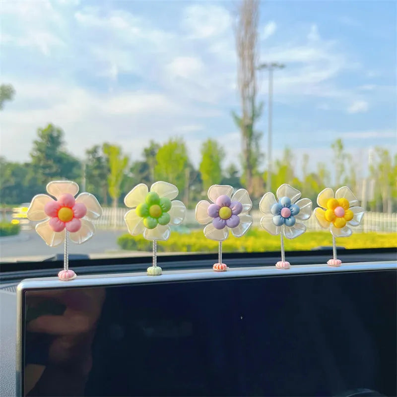 Small plastic car decoration swing measuring 5cm tall in blue, green, pink, purple, and yellow colour options