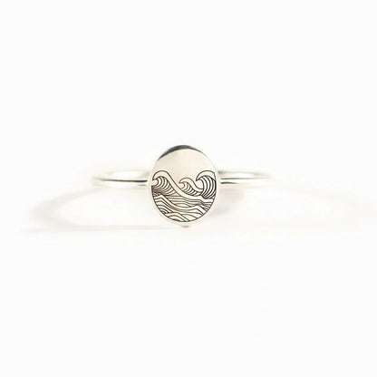 Sterling silver ring with elegant wave-inspired design, inspired by the natural beauty of the British coastline