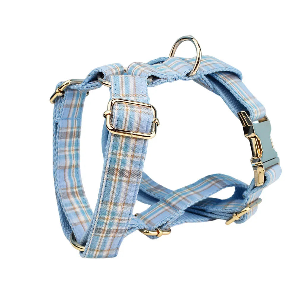 Sky blue grid forest pattern dog collar, leash, bow, and vest four-piece pet accessory set