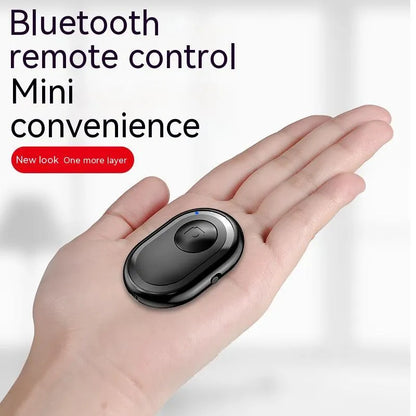 Black wireless Bluetooth remote control for cameras with tripod mount thread