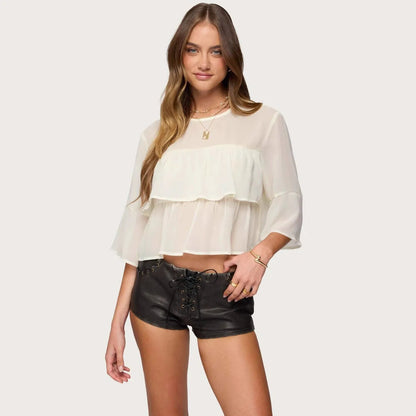 Creamy white chiffon t-shirt with batwing long sleeves on woman