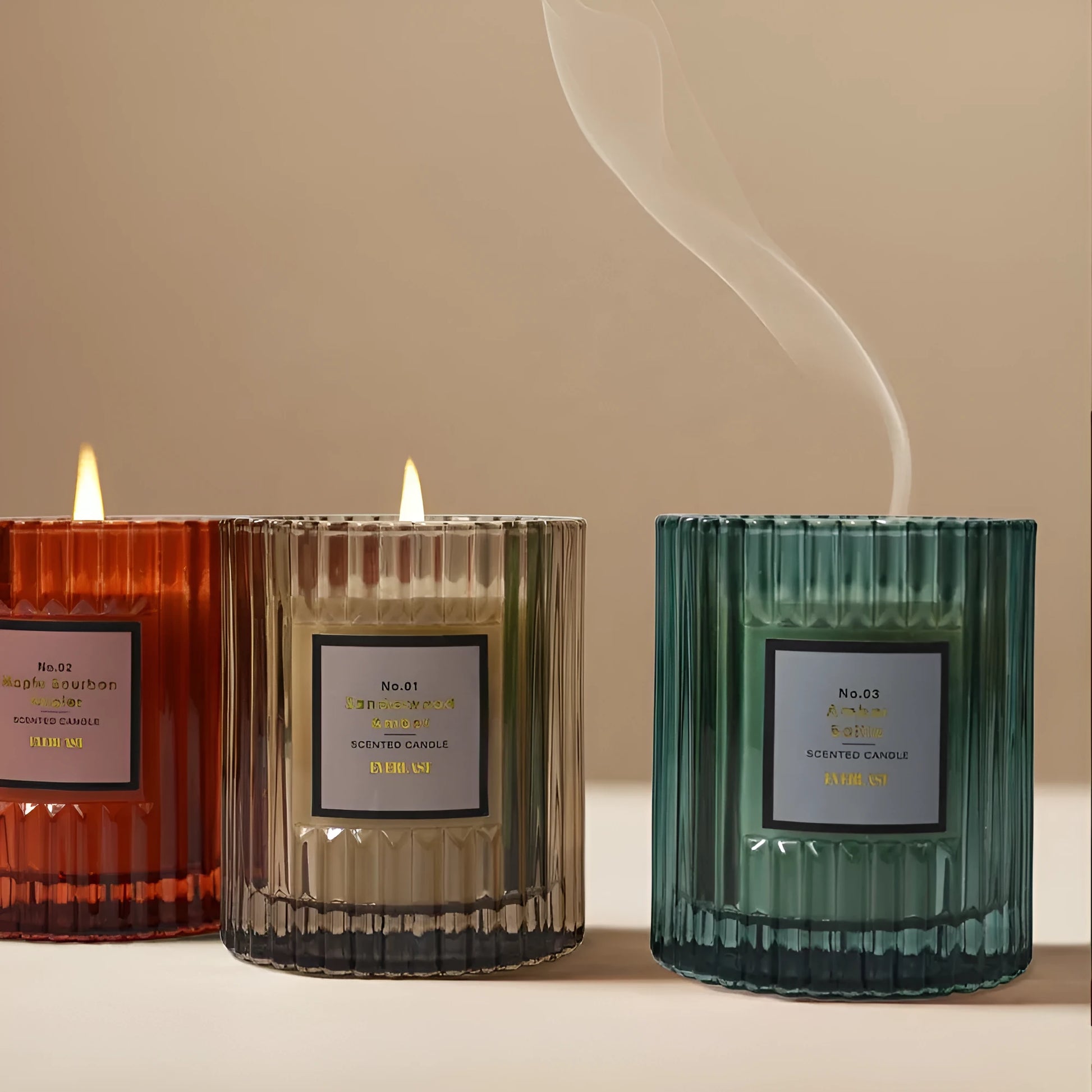 Soy wax aromatherapy candle in cylindrical shape showing red, green and amber colour options