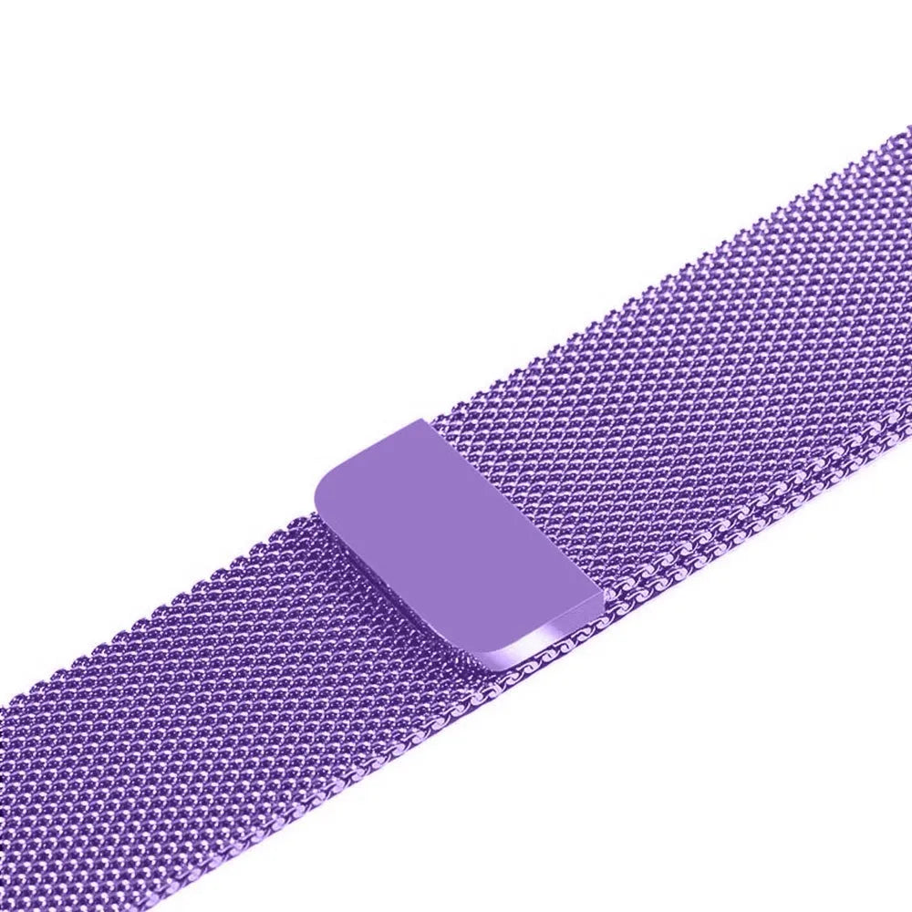 Stainless steel Apple Watch strap in silver on a wrist, showing the metal links and secure clasp.