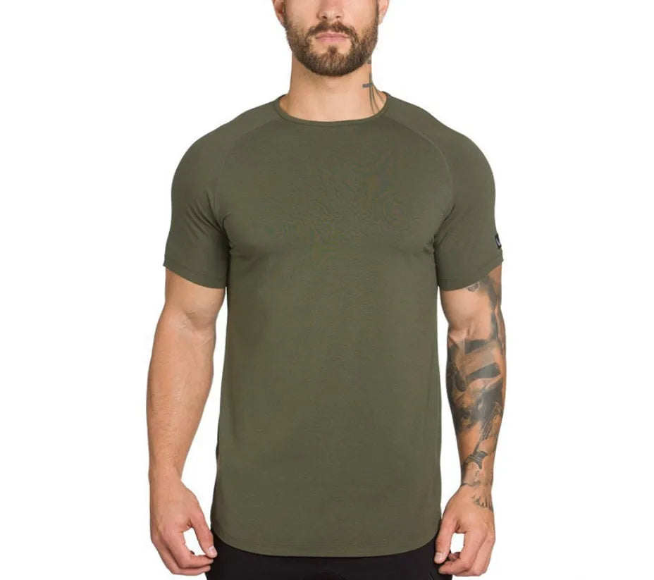 Men's plain grey gym shirt, blouse style, on a hanger showing relaxed fit and cotton-spandex fabric.