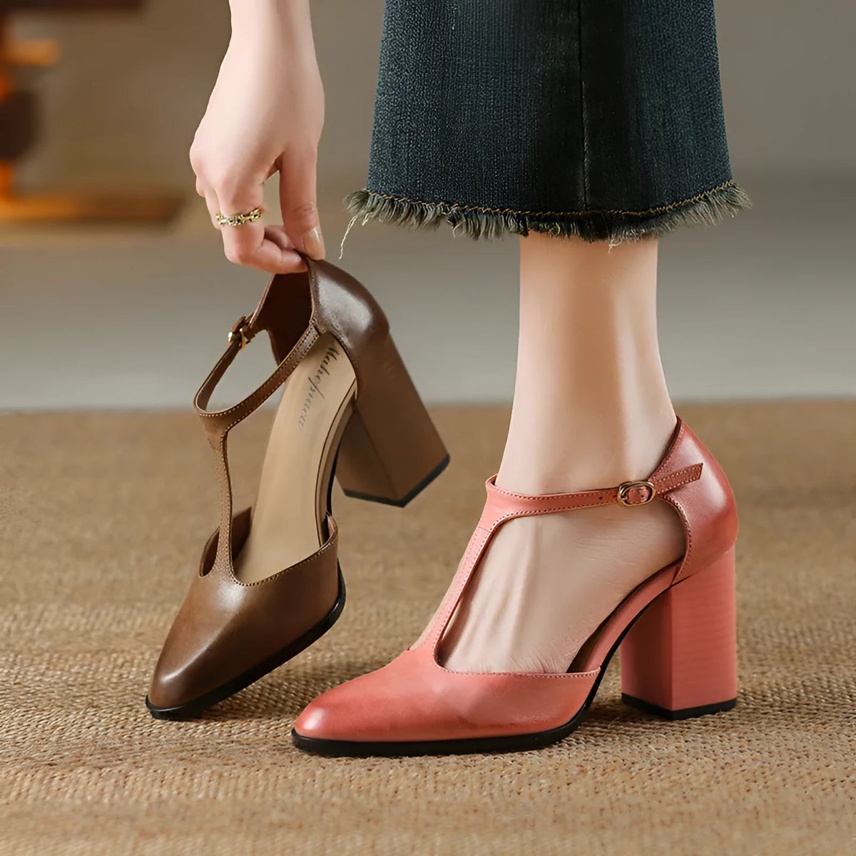 Baotou hollow retro women's Mary Jane shoes in pink with pointed toe and buckle.