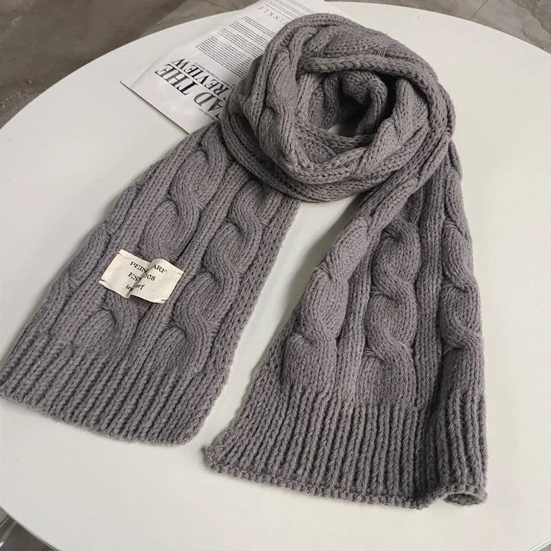 Soft, velvety Apricot Scarf with elegant patterns, perfect for keeping warm during the British winter