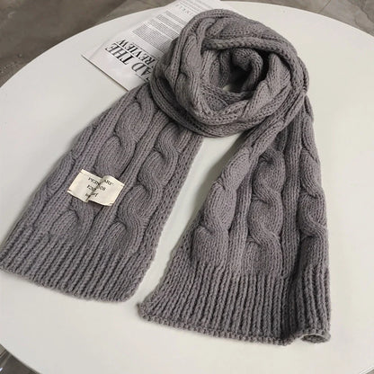 Soft, velvety Apricot Scarf with elegant patterns, perfect for keeping warm during the British winter