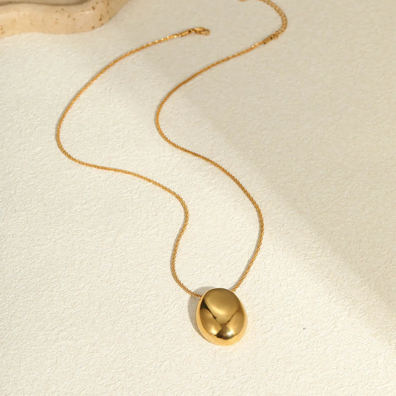Long geometric necklace with 18K gold plating and stainless steel construction featuring a contemporary geometric pendant design suitable for fashion-forward office wear with adjustable chain length between 41cm and 50cm