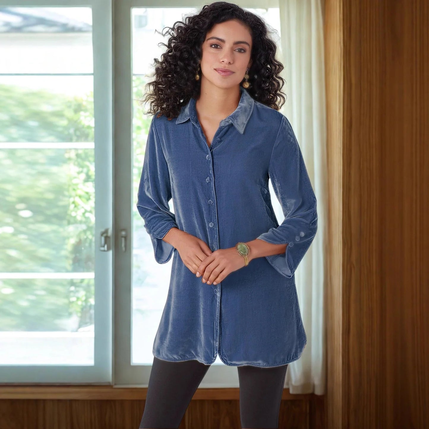 Gold velvet bell sleeve shirt with lapel slit button front showing loose fit and flared cuffs
