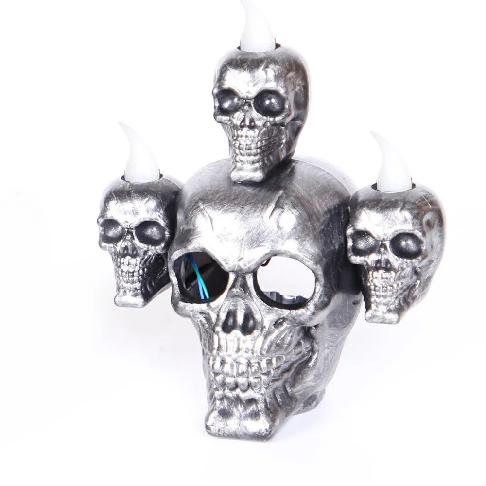 Gold and silver plastic Halloween skull ornament with LED lights for indoor decoration