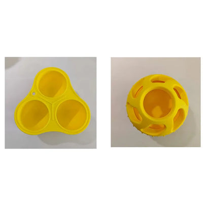 Yellow silicone pet slow feeding ball with treat-dispensing moulded interior for dental cleaning