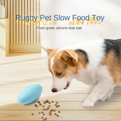 Blue silicone rugby ball dog toy with ridges and hollow centre for treats