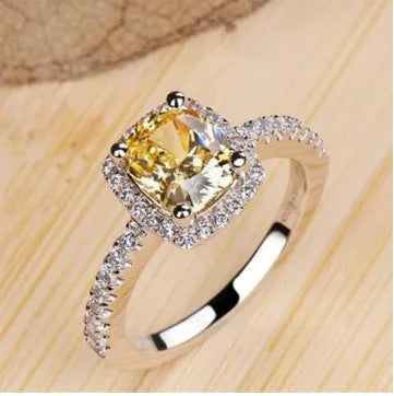 Women's silver colour alloy ring with artificial gemstone inlay and geometric design, bridal style.