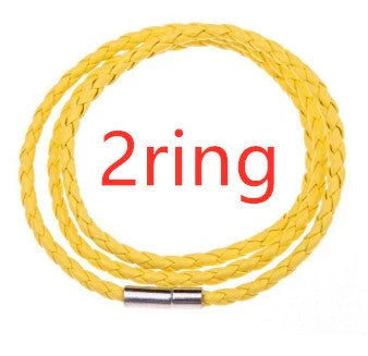 A personalized leather bracelet with engraved beads, a thoughtful gift for men