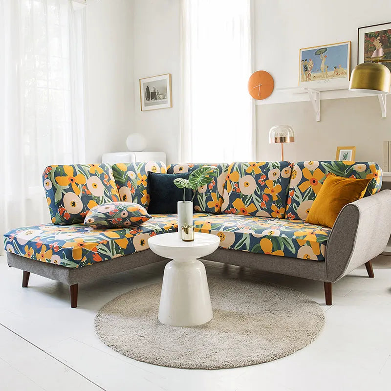 Sofa cover set with a plant flower pattern in a rustic style, shown on a sofa.