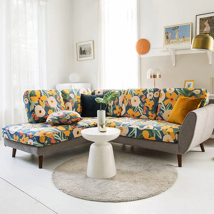 Sofa cover set with a plant flower pattern in a rustic style, shown on a sofa.