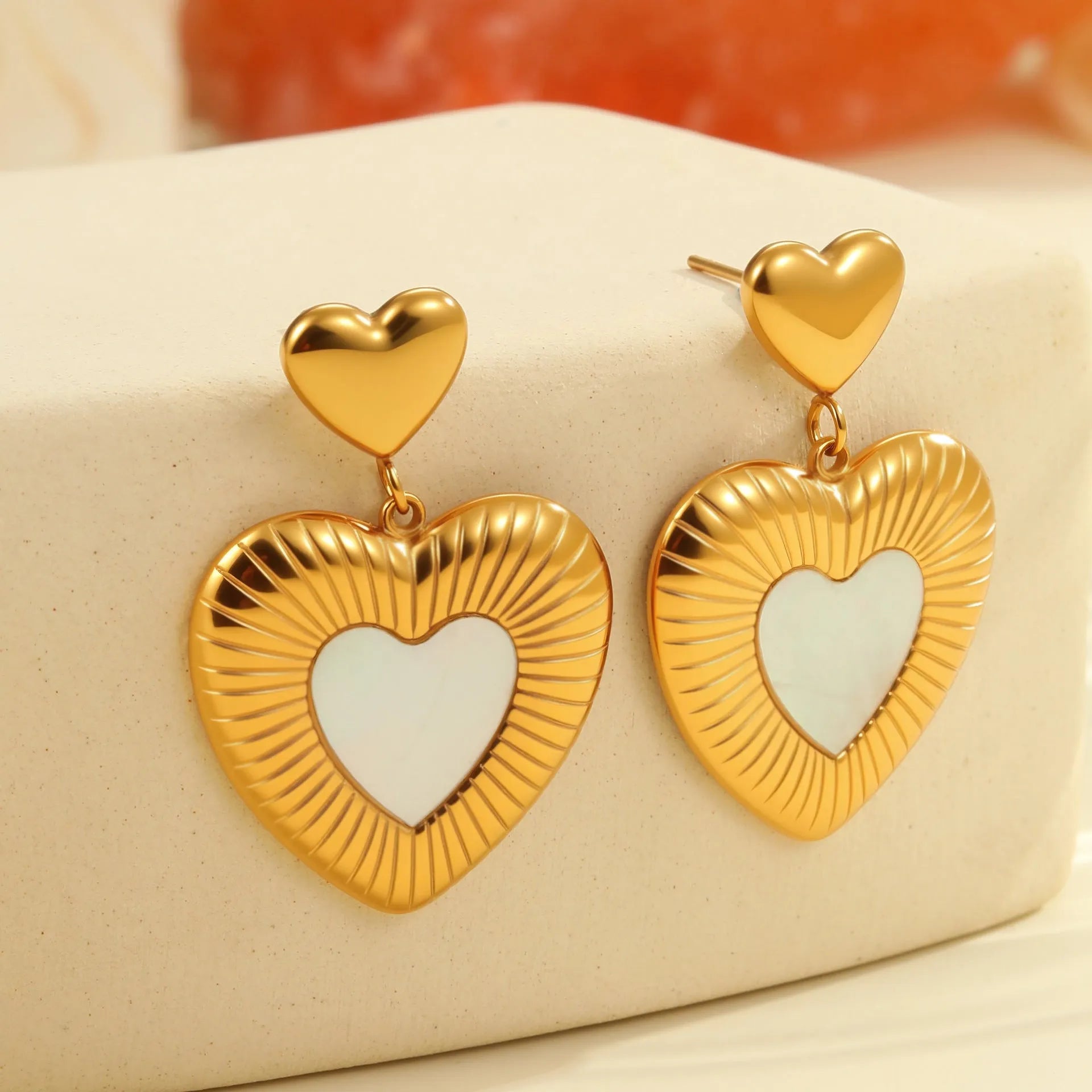 Women's gold heart fritillary earrings with stainless steel construction and 18K electroplating
