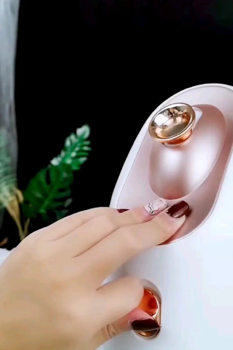 Dual-temperature facial steamer for hot and cold skin therapy, compact and stylish design