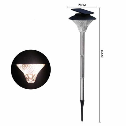 Solar-powered outdoor street light with solar panel on top and LED light fixture.
