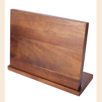 Solid wood magnetic knife holder in wood colour for kitchen storage.