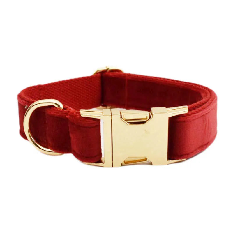 Cloth dog collar set with matching leash, bow tie, vest, and poop bag accessories