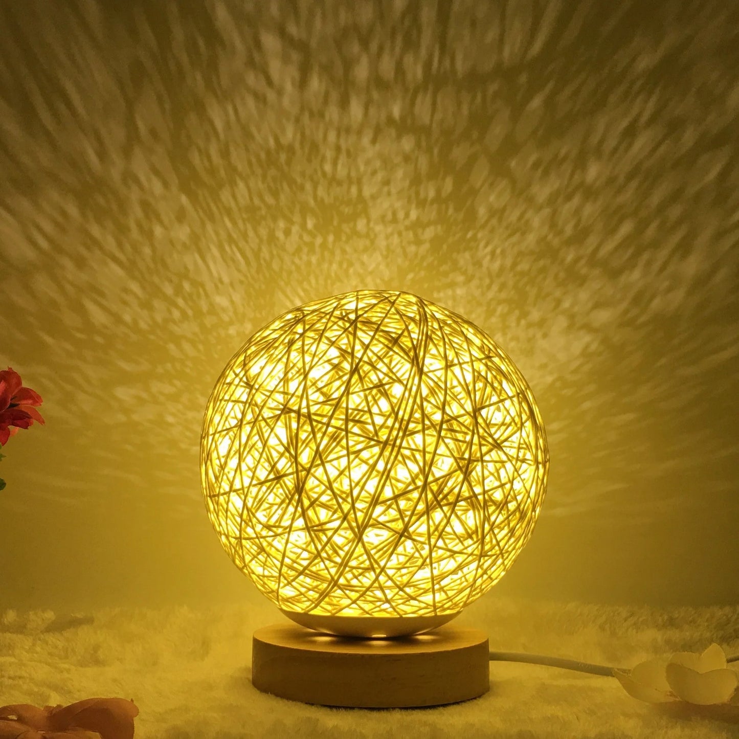 LED rattan table lamp with hand-knit linen shade in various colours