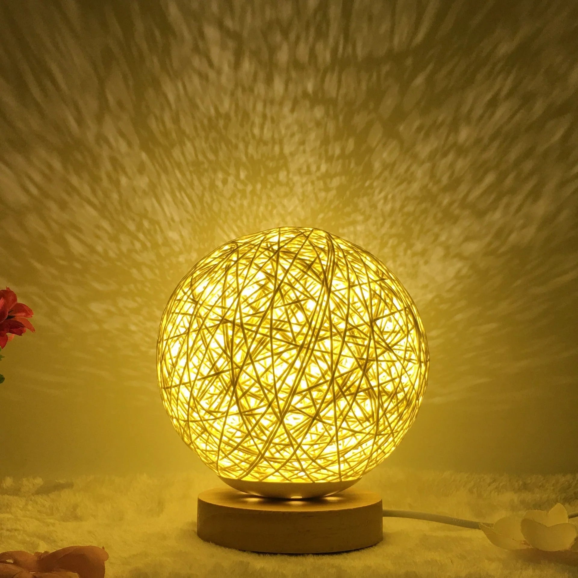 LED rattan table lamp with hand-knit linen shade in various colours