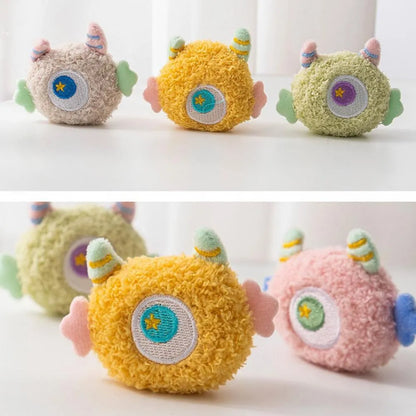 Plush cartoon dog chew toy with large eyes and squeaker in grey, green, pink, white or yellow