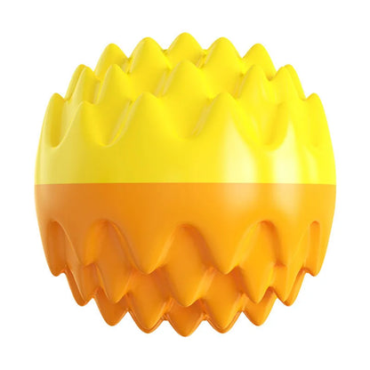 Blue and orange spiky rubber dog ball with squeaker for teeth cleaning and water fetch.
