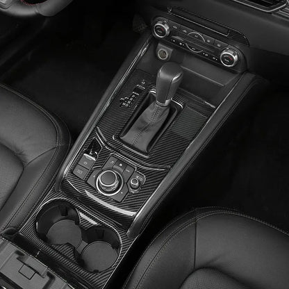 Carbon fibre patterned left and right steering wheel frame overlays for car interior upgrade.