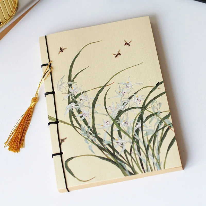 A5 antique wire-bound notebook with classical artwork cover, black oil wax rope binding, and decorative tassels