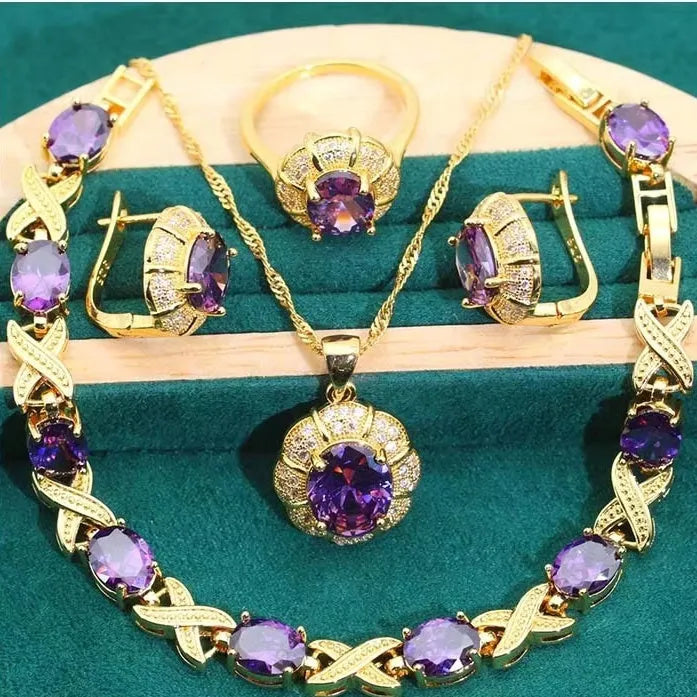 18k gold plated jewellery set with multi-colour zircon stones showing necklace, earrings, ring, and bracelet