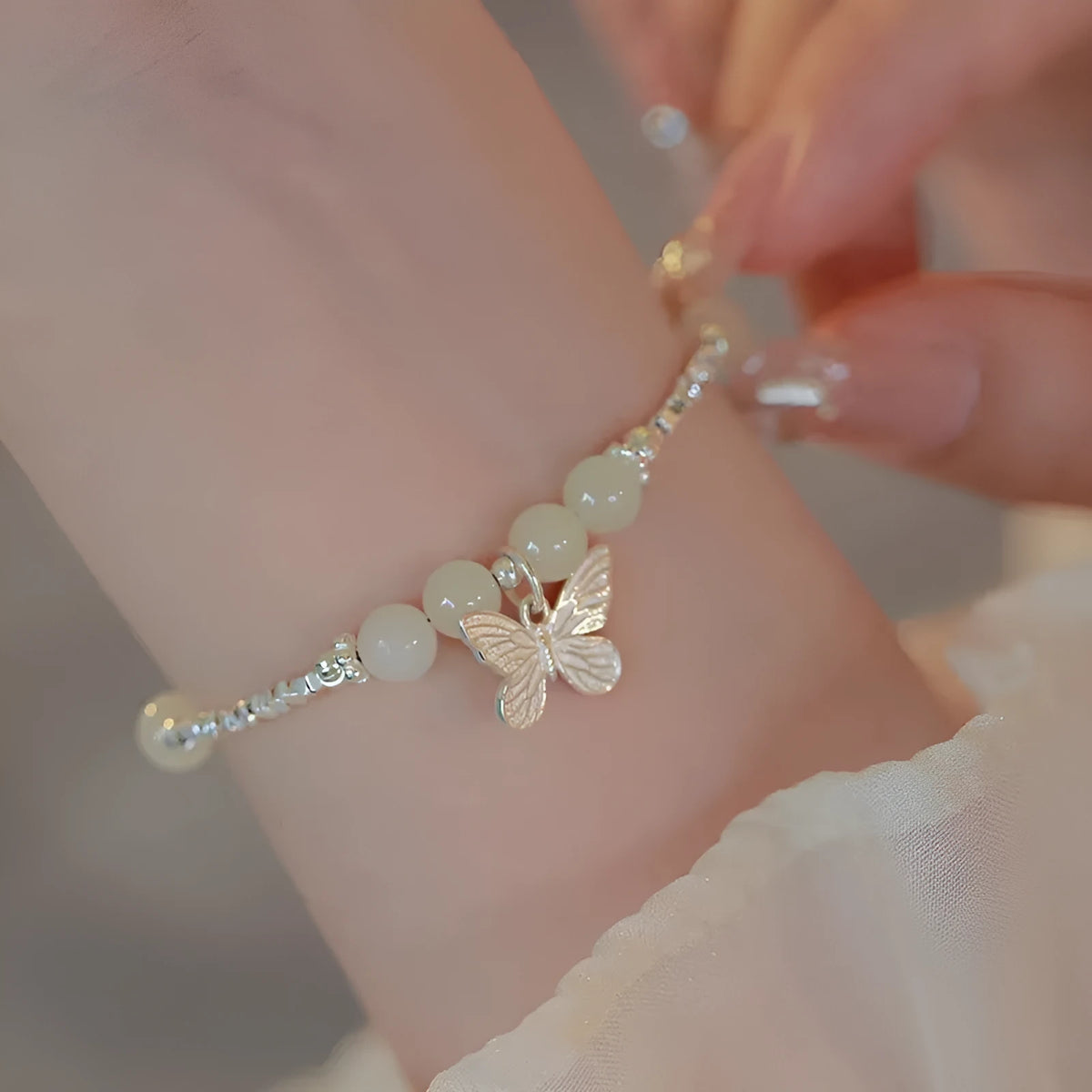 Women's butterfly bracelet and necklace jewellery set with electroplated silver finish
