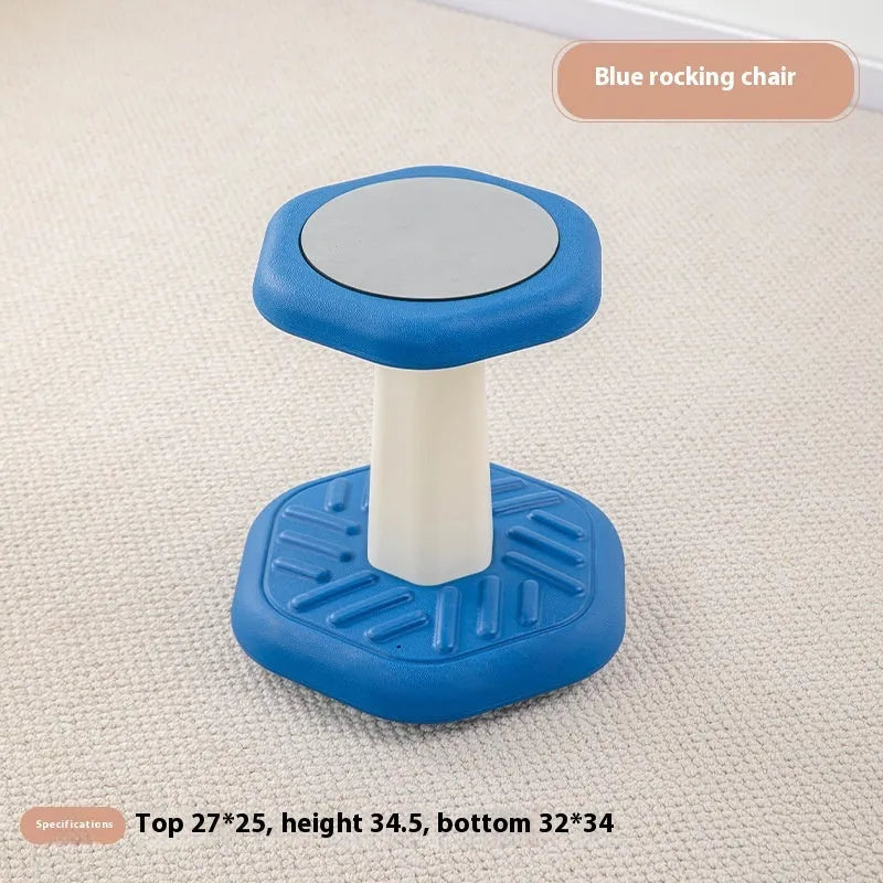 Balance children's plastic rocking stool in blue colour on a wooden floor.