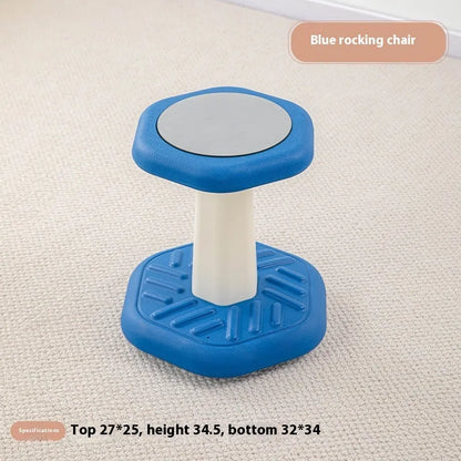 Balance children's plastic rocking stool in blue colour on a wooden floor.