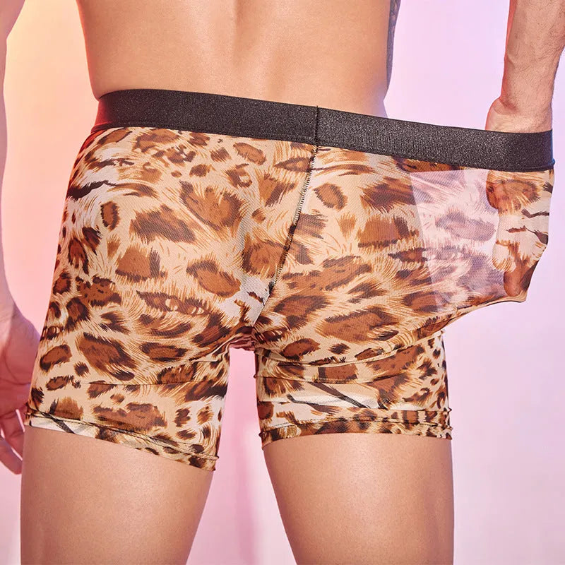Men's leopard print nylon boxer shorts laid flat, showing the animal pattern design.
