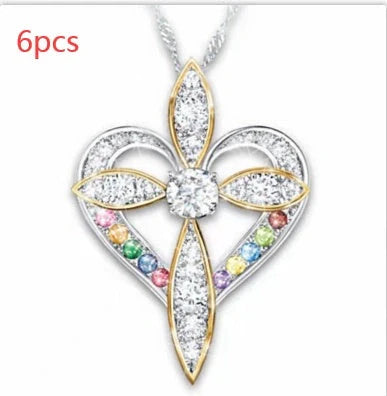 Elegant heart-shaped cross pendant necklace with adjustable chain, perfect for faith and fashion lovers.