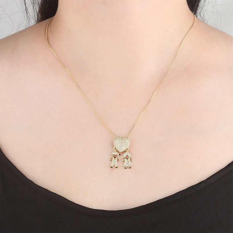Gold cubic zirconia heart pendant necklace for mothers, symbolising family love.