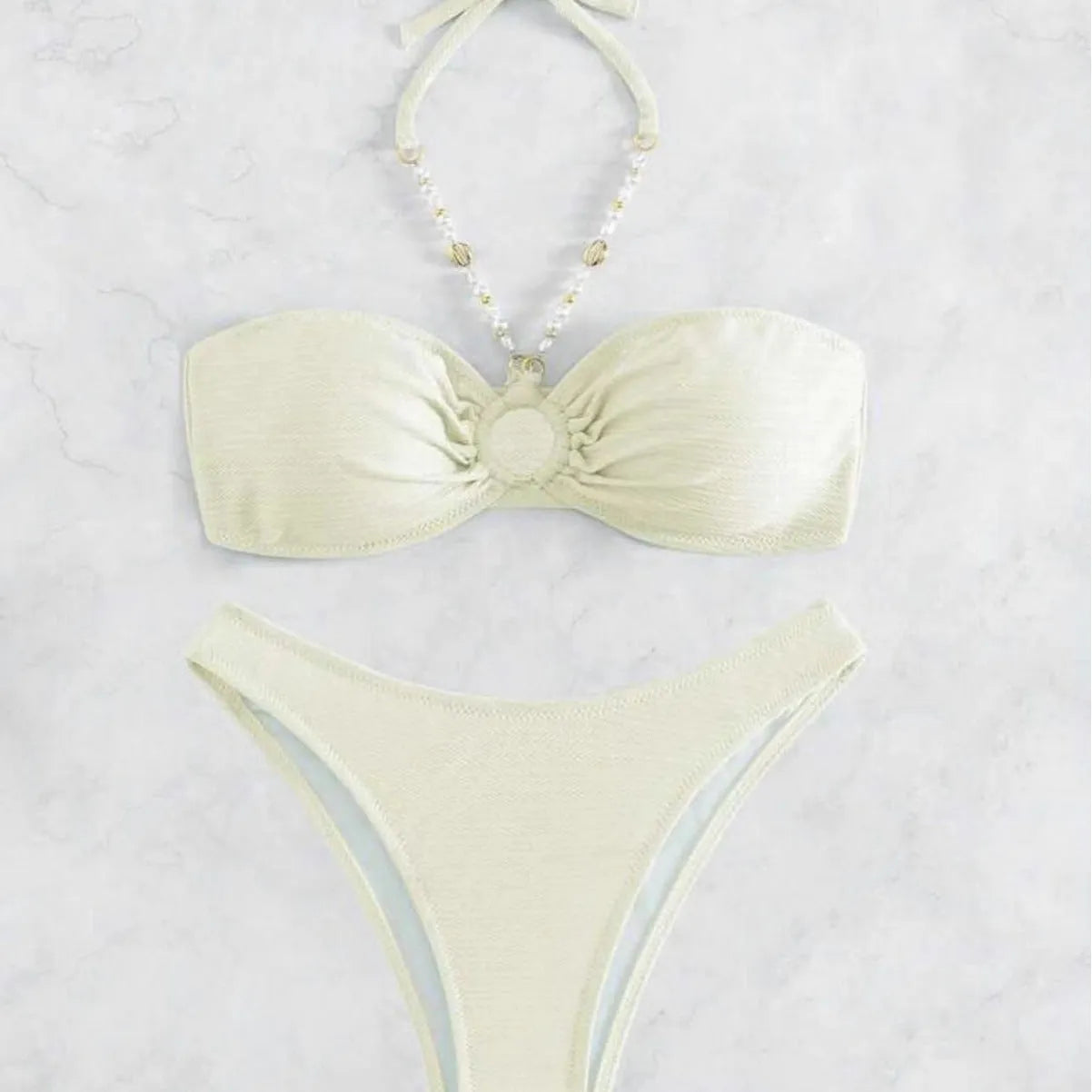 Women's halter beach bikini in solid colour with briefs, polyester spandex construction