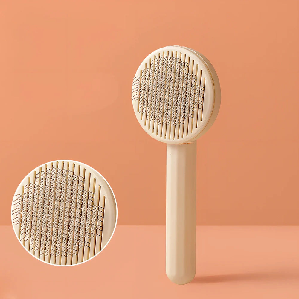 Self-cleaning cat comb with floating needle teeth and built-in hair storage chamber in assorted colours