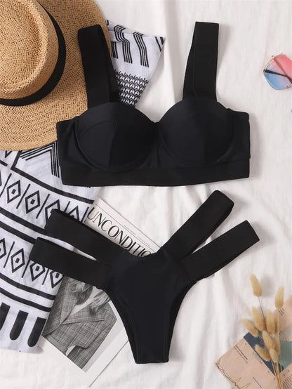 Women's rose red and black contrast colour bikini swimsuit with push-up support.