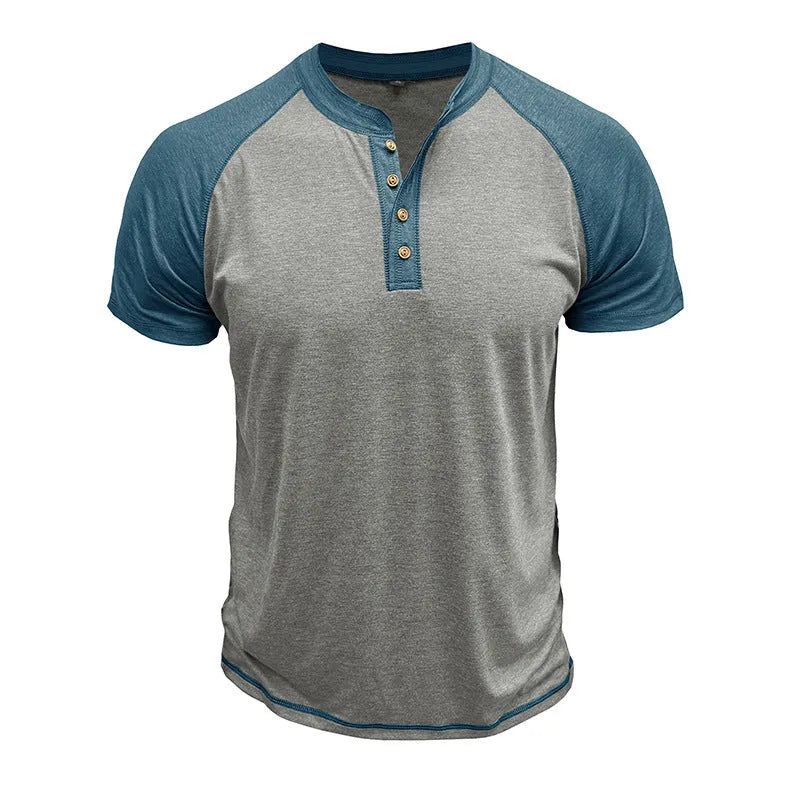 Men's short sleeve top with colour block design showing contrasting colour panels and raglan sleeves