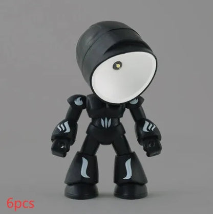 Mini mecha robot hero LED night light with adjustable arms on a desk.