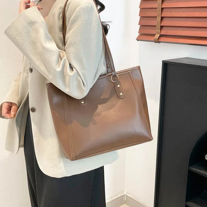 Korean style black PU leather shoulder underarm bag with a horizontal square shape and sandwich pocket.