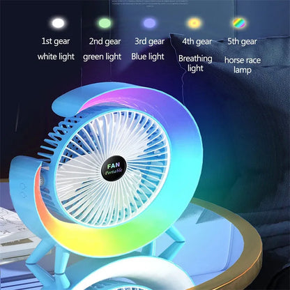 Grass green USB desktop fan with night light on a wooden desk