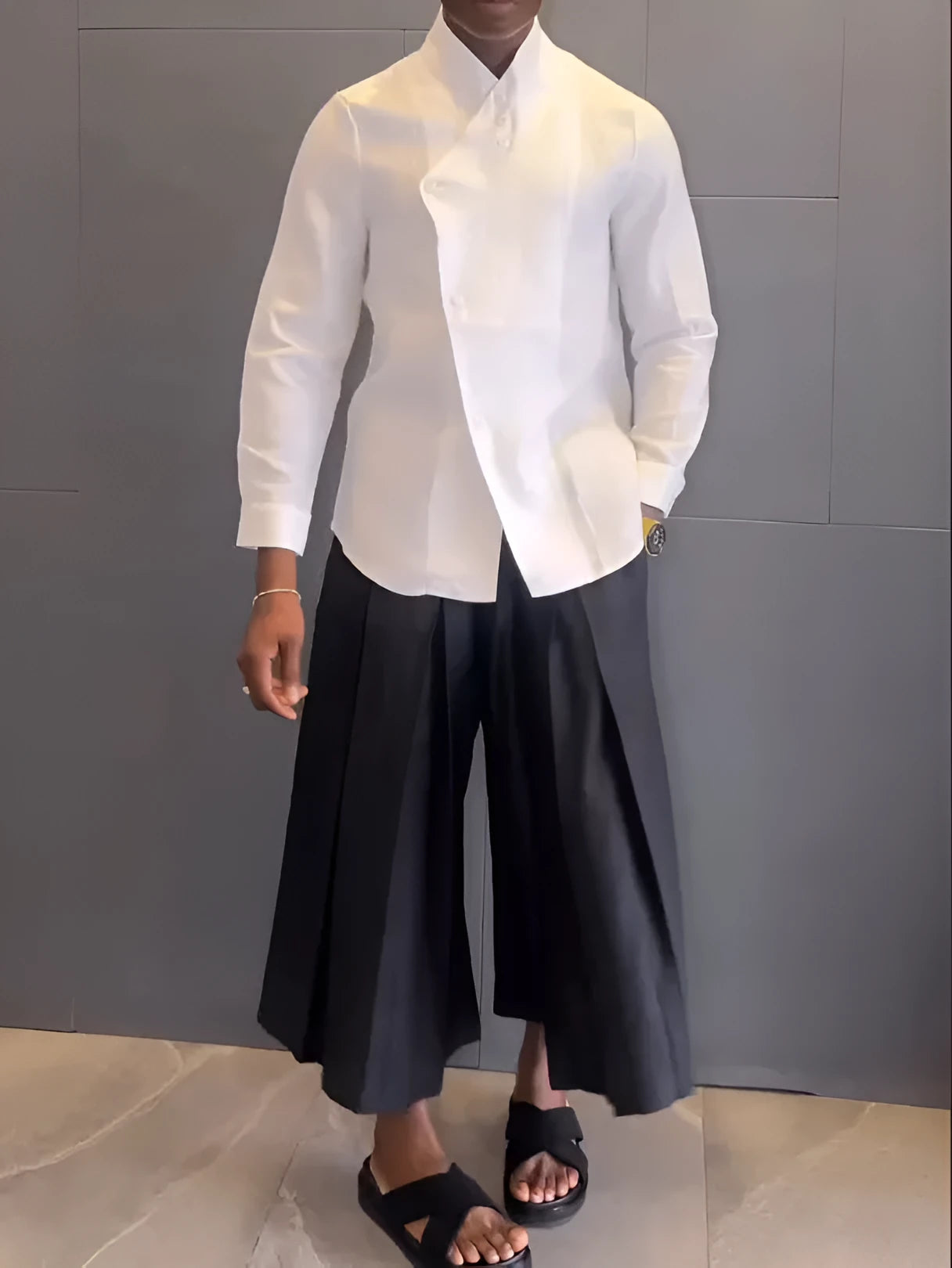 White asymmetric long-sleeve shirt and black pleated trousers casual polyester set.
