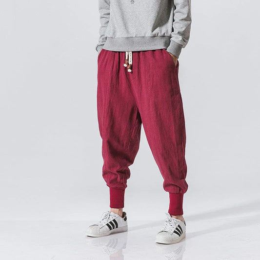 Men's harem trousers made of soft cotton and linen, featuring an elastic waistband and relaxed silhouette for all-day comfort.